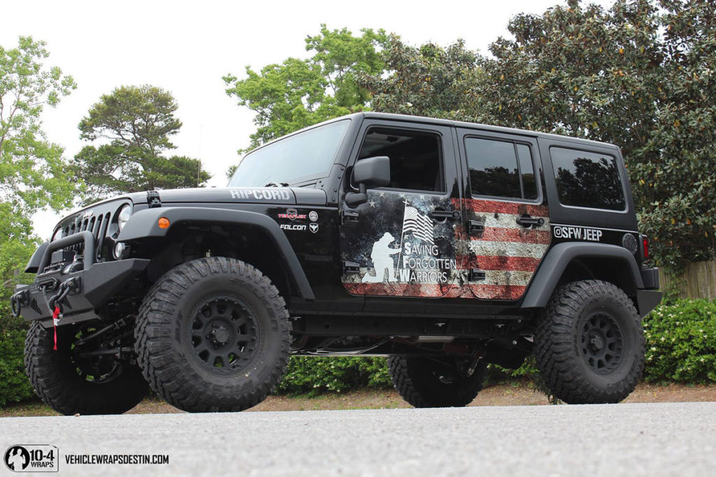 Side view of Jeep Rubicon wrapped with the American flag in Destin