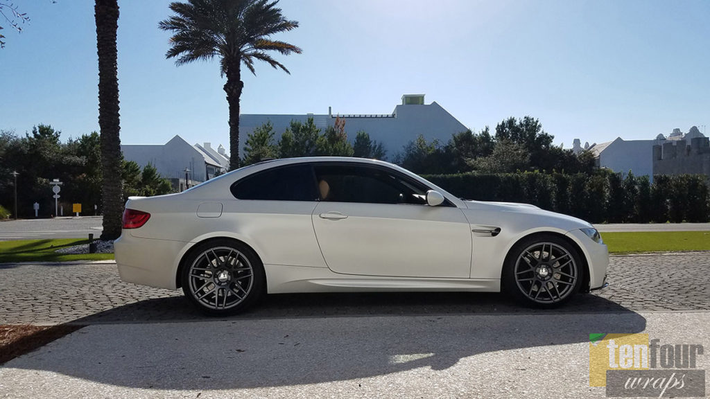 Satin White Pearl BMW M3 rear angle view