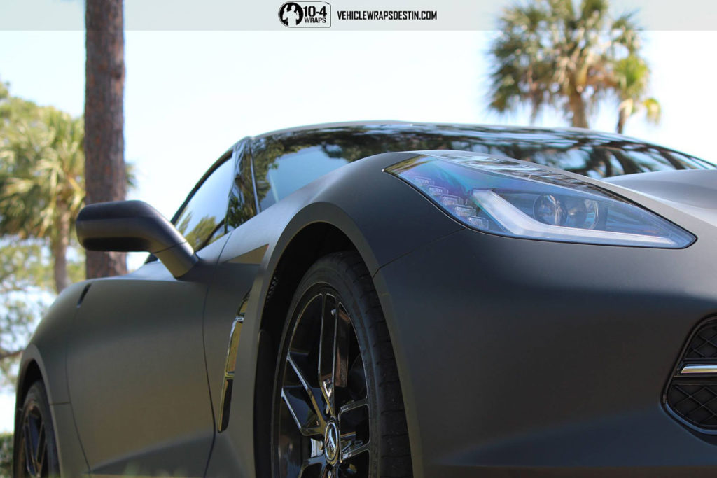 Side view of Corvette C7 matte black wrap in Destin