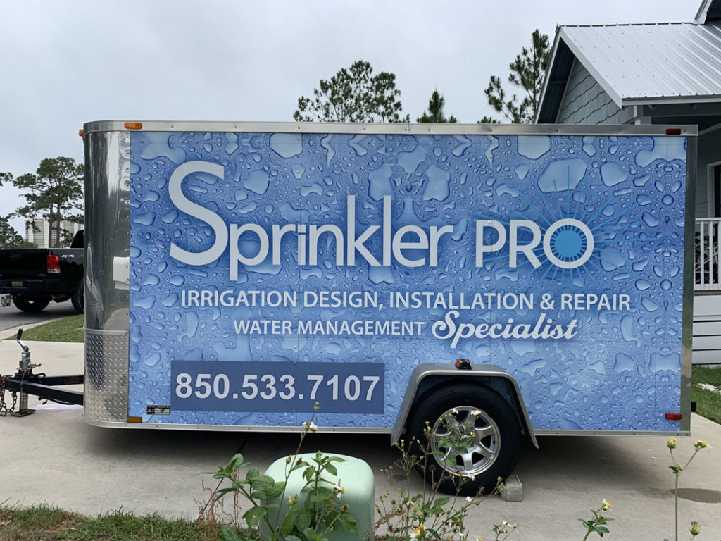 Before and after transformation of a trailer with a full wrap