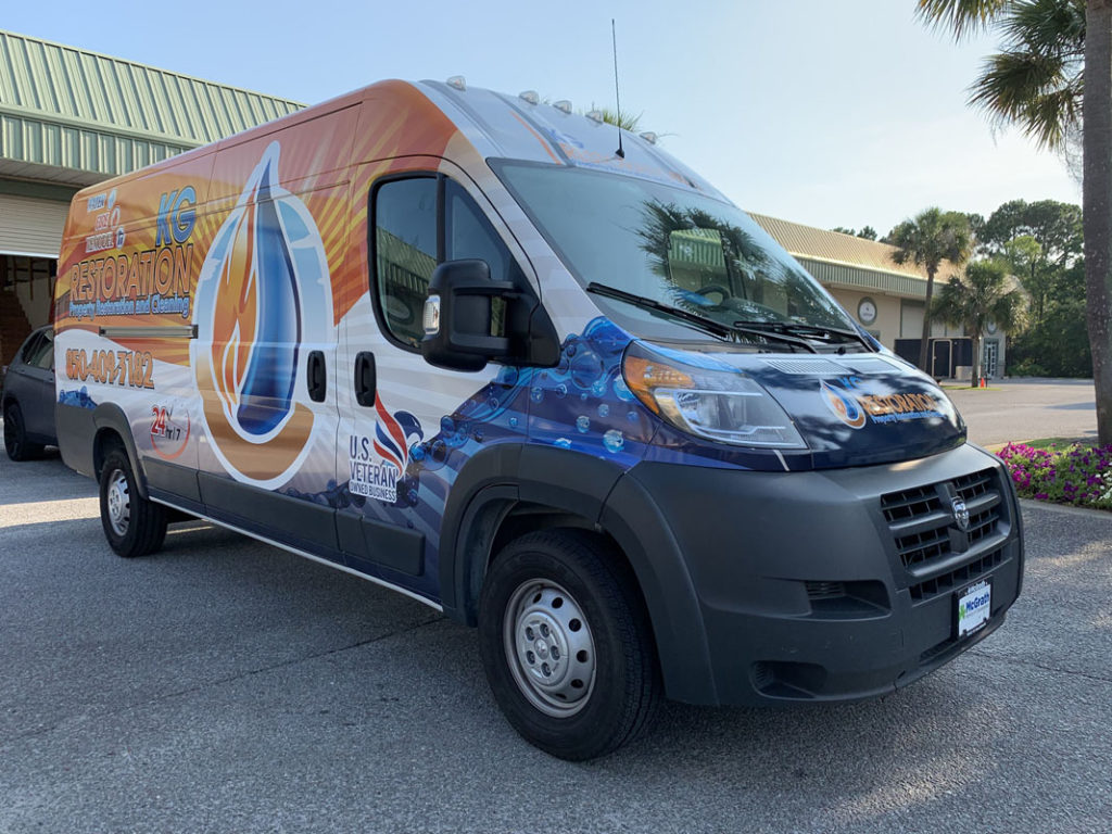 Vinyl-wrapped van promoting a small business through mobile advertising.