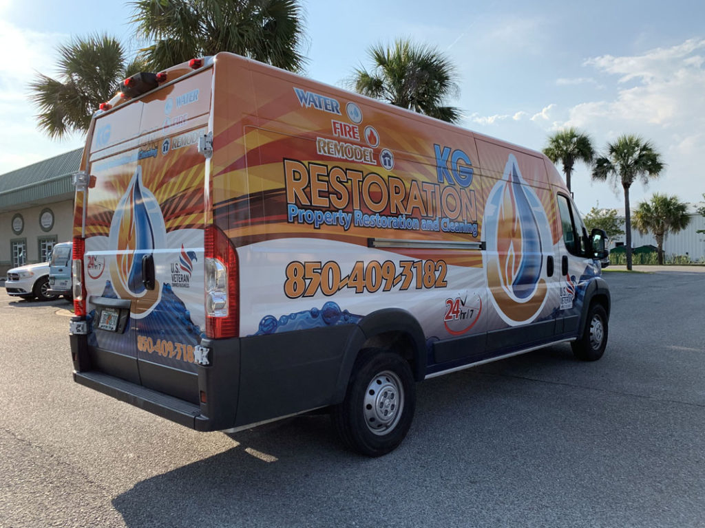 Fleet of wrapped company vehicles lined up for promotional use.
